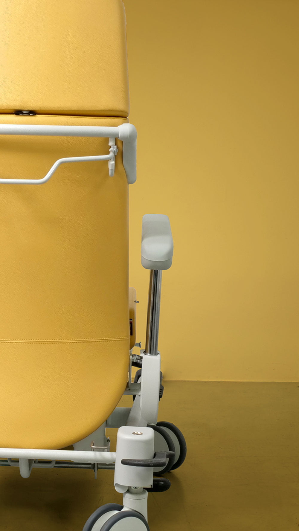 photo de dos d'un fauteuil de transfert médicalisé Navailles Rhéa